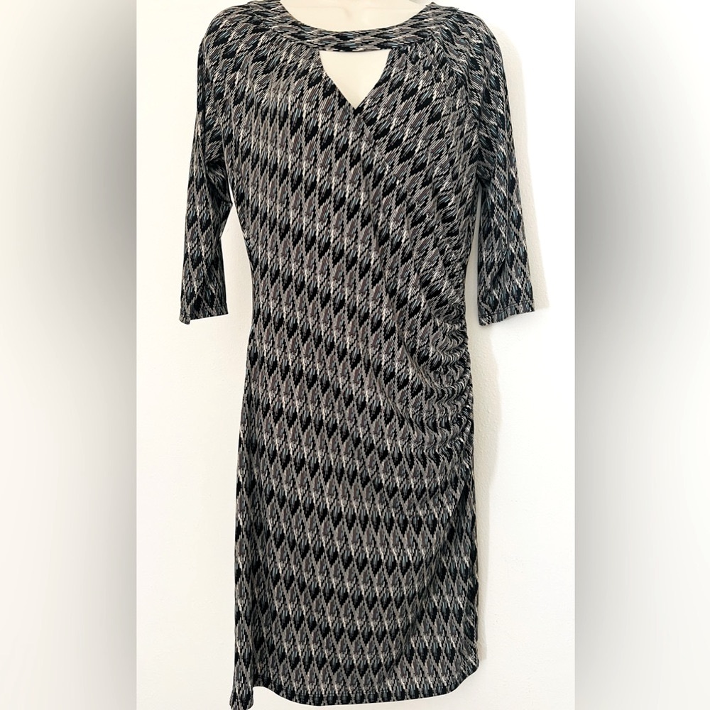 This dress is from Miss Tina by Tina Knowles, Polyester and Spandex blend in M